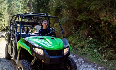 SxS navigating an rugged off-road terrain.
